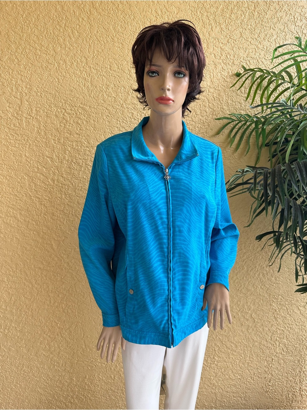 Draper’s & Damon’s turquoise animal print jacket